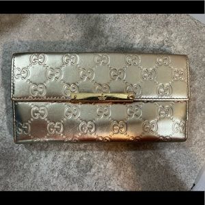 Gold shimmery Gucci wallet